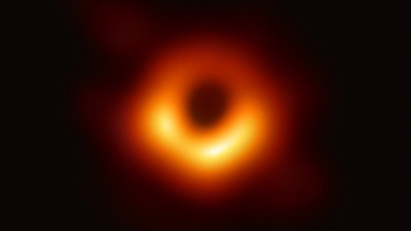 First Photo Of A Black Hole Released - This Giant Monster Is Larger Than Our Entire Solar System!