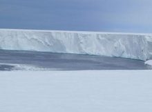 The Ross Polynya where solar heat is absorbed by the ocean. The vertical wall of the ice front stretches a distance of 600 km. Credit: Poul Christoffersen