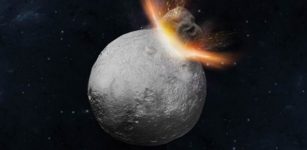 Artist's concept of a massive ‘hit-and-run’ collision hitting Asteroid Vesta