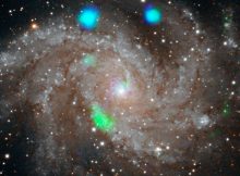 This visible-light image of the Fireworks galaxy (NGC 6946) comes from the Digital Sky Survey, and is overlaid with data from NASA's NuSTAR observatory (in blue and green). Credit: NASA/JPL-Caltech