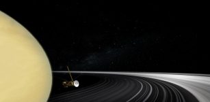 An artist’s impression of the Cassini spacecraft among Saturn’s rings.