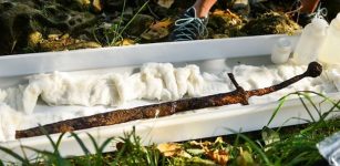 Real-Life Excalibur Found Underwater In Bosnia - Medieval Sword In Stone Pulled Out