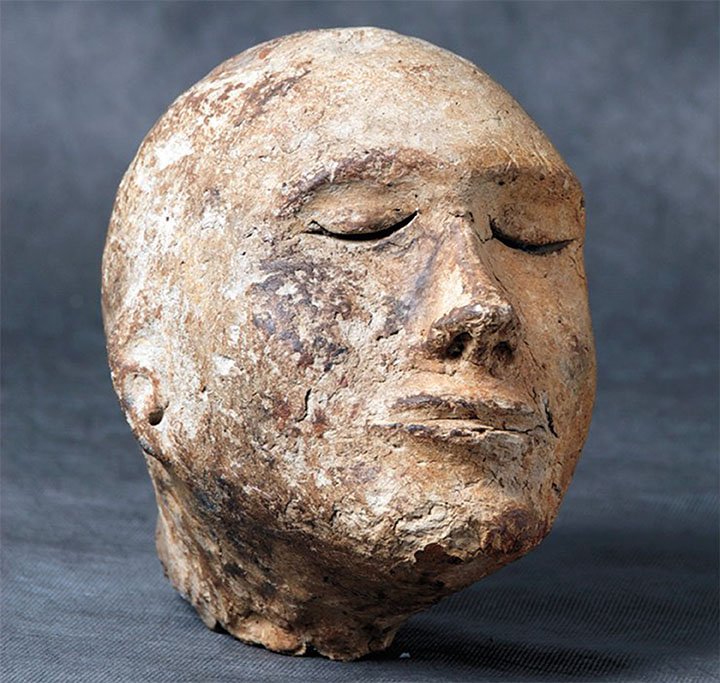 Mystery Of Unique 2,100-Year-Old Human Clay Head With A Ram's Skull Inside