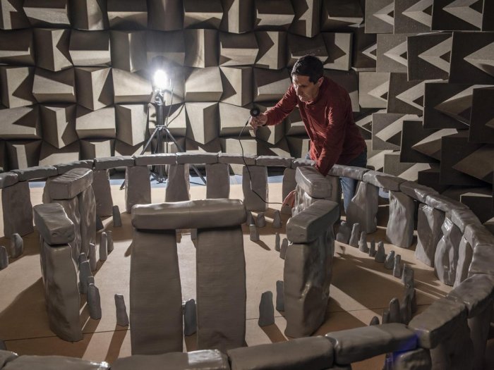 Professor Trevor Cox, who led the research, placing an ultrasonic test loudspeaker in the Stonehenge model. Credit: University of Salford