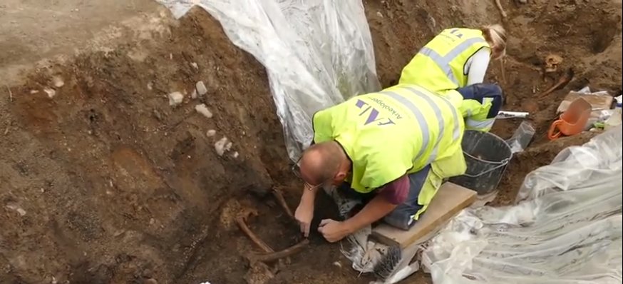 Caroline Arcini and Anton Seiler investigating this rare Viking ship burial in Sweden. Credit: Arkeologerna