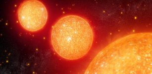 Illustration of red giant stars near and far sweeping across the sky. Credit: NASA