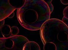 An artist's impression of the colliding bubbles that can produce extremely low frequency gravitational waves during a cosmological phase transition in the early Universe. Image credit: Riccardo Buscicchio.