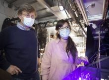 Prof. Mikhail Lukin (left) and Giulia Semeghini, lead researcher, observe a state of matter predicted and hunted for 50 years but never previously observed. Inside the LISE building they study Quantum spin liquids using lasers. Kris Snibbe/Harvard Staff Photographer. Credit: Kris Snibbe/Harvard Staff Photographer