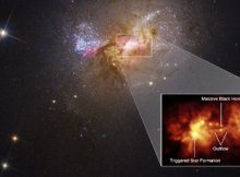 A pullout of the central region of dwarf starburst galaxy Henize 2-10 traces an outflow, or bridge of hot gas 230 light-years long, connecting the galaxy's massive black hole and a star-forming region.