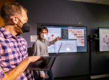 Sandia National Laboratories researchers Andrew Baczewski, left, and Erik Nielsen use gate set tomography to analyze problems in a quantum processor. (Photo by Rebecca Gustaf)