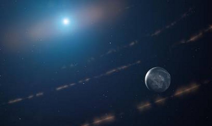 An artist’s impression of the white dwarf star WD1054–226 orbited by clouds of planetary debris and a major planet in the habitable zone.