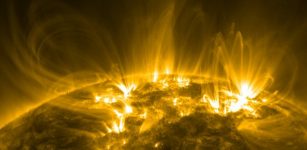 Scientists think SGR 1830's hot spots likely resembled the bases of coronal loops frequently seen on the Sun. In this extreme ultraviolet view from NASA's Solar Dynamics Observatory, loops of ionized gas trace magnetic fields emerging from the solar surface. Credit: NASA/SDO