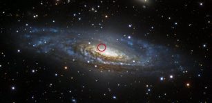 The supernova known as 2014C took place eight years ago—but scientists are still watching and learning from its aftermath. The very faintly visible explosion is shown circled in red. Credit: Sloan Digital Sky Survey