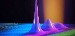 A laser beam (orange) creates excitons (purple) that are trapped inside the semicondcutor material by electric fields. Credit: Puneet Murthy / ETH Zurich