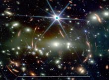 This JWST image shows the galaxy cluster SMACS J0723.3−7327 with a large number of lensed background galaxies. The white bar at the bottom corresponds to 50 arcsec, which is approximately the maximum size of Jupiter observed from Earth. Credit: NASA, ESA, CSA and STScI