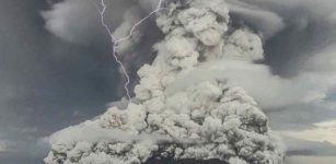 Hunga Tonga–Hunga Ha‘apai volcano erupts on 14 January 2022 in this still from a video posted to social media. Credit: Tonga Geological Services