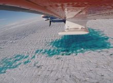 Measuring ice thickness with the ultra wideband ice radar system, attached to the aircraft's wings. Credit: Alfred-Wegener-Institut / Tobias Binder