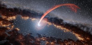 This illustration shows a glowing stream of material from a star as it is being devoured by a supermassive black hole in a tidal disruption flare. When a star passes within a certain distance of a black hole - close enough to be gravitationally disrupted - the stellar material gets stretched and compressed as it falls into the black hole. Credit: NASAJPL-Caltech