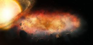Massive Cloud With Metallic Winds Discovered Orbiting Mystery Object